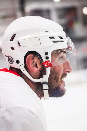 Canes forward Stefan Noesen (#23) waiting his turn for a drill at practice.